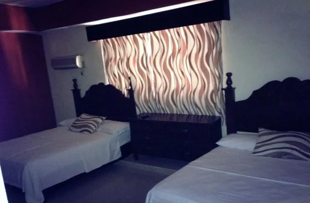 Hotel Pegasus La Vega room 2 large bed 1